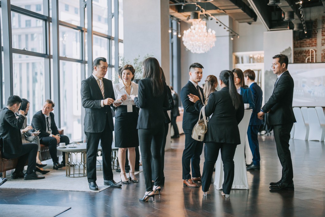 group of real estate agents gather for real estate networking