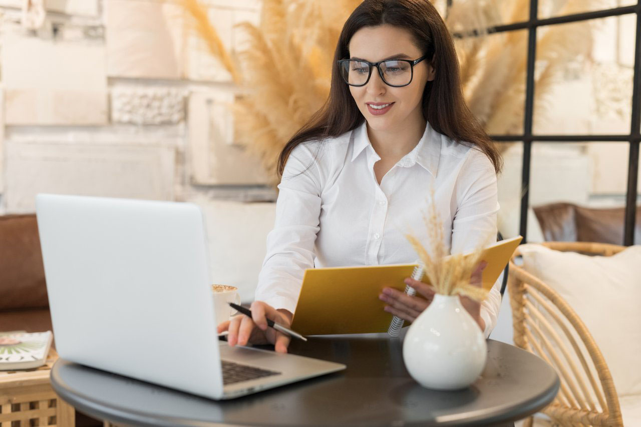 woman researches Florida real estate school